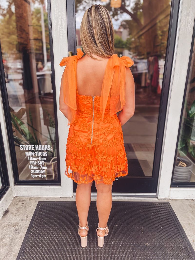 Slice of orange mini dress